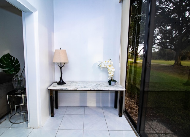 interior space featuring light tile floors