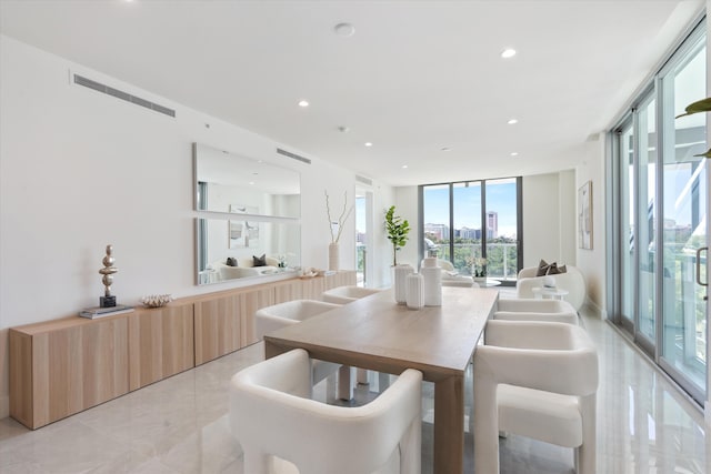 485 E Royal Palm Rd Unit 604, Boca Raton, FL 33432 - dining room with a wall of windows, visible vents, a city view, and recessed lighting