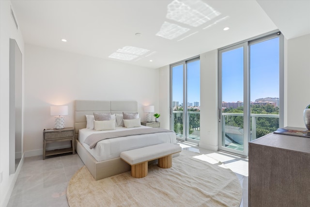 485 E Royal Palm Rd Unit 604, Boca Raton, FL 33432 - bedroom featuring a view of city, recessed lighting, a wall of windows, baseboards, and access to exterior