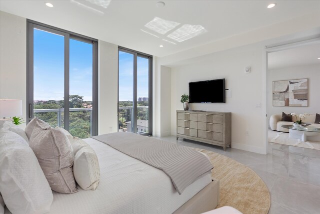 485 E Royal Palm Rd Unit 604, Boca Raton, FL 33432 - bedroom with recessed lighting, baseboards, and expansive windows