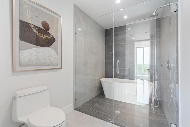485 E Royal Palm Rd Unit 604, Boca Raton, FL 33432 - bathroom featuring tile patterned flooring, tile walls, toilet, and a stall shower