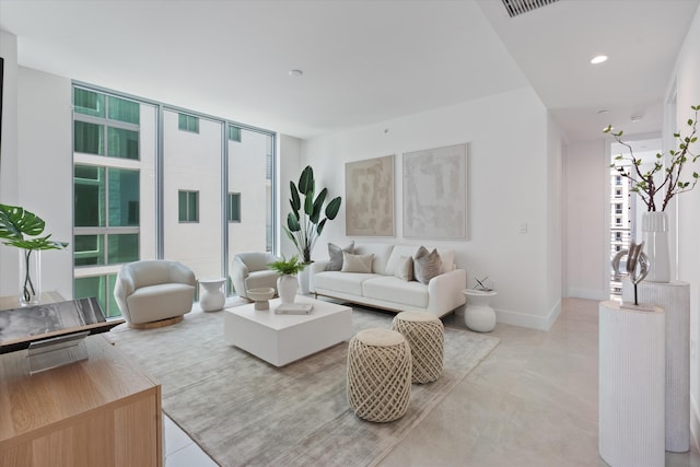 485 E Royal Palm Rd Unit 604, Boca Raton, FL 33432 - living room featuring a wall of windows, baseboards, plenty of natural light, and recessed lighting