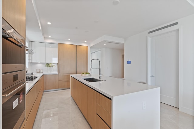 485 E Royal Palm Rd Unit 604, Boca Raton, FL 33432 - kitchen with an island with sink, recessed lighting, stainless steel appliances, modern cabinets, and a sink