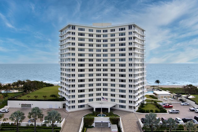 view of building exterior featuring a water view