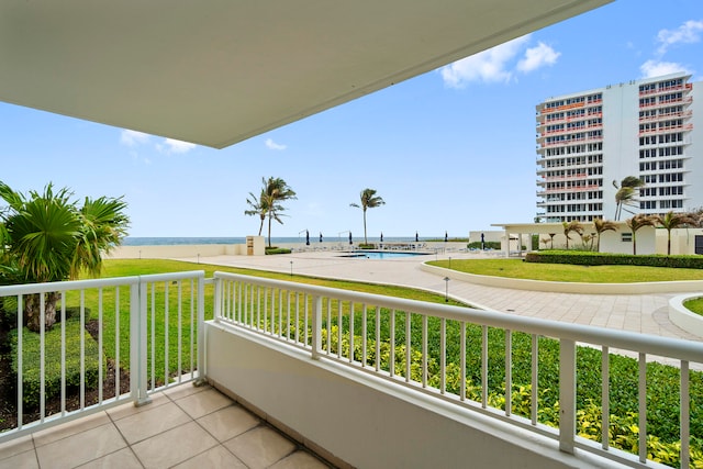 balcony featuring a swimming pool