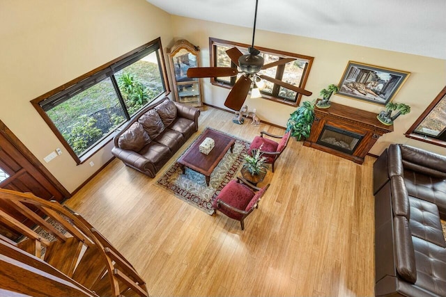 unfurnished bedroom with a wall unit AC and light hardwood / wood-style floors