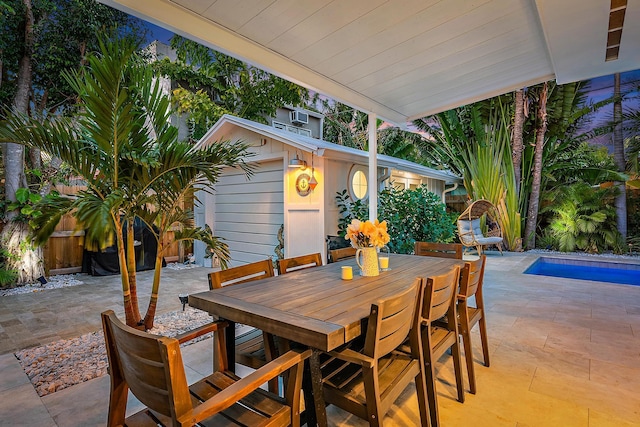 view of patio / terrace featuring an outbuilding