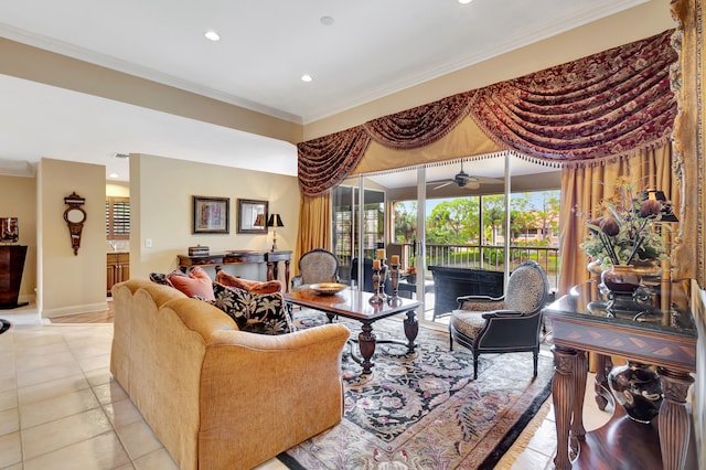 living room featuring ceiling fan, ornamental molding, and light tile floors