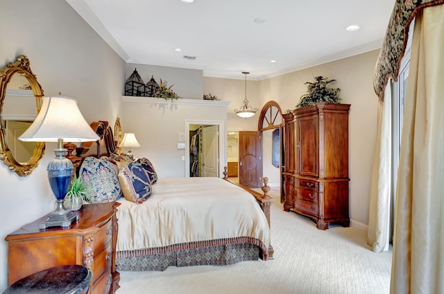 bedroom with crown molding and light colored carpet