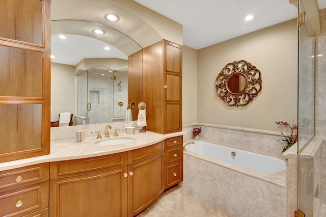 bathroom featuring tile flooring, plus walk in shower, and vanity