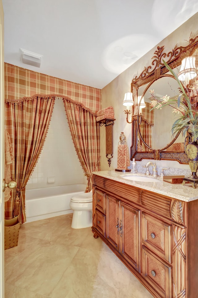 full bathroom featuring tile floors, toilet, vanity, and shower / tub combo with curtain