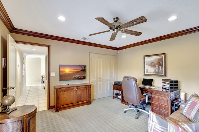 office featuring light colored carpet, ceiling fan, and crown molding