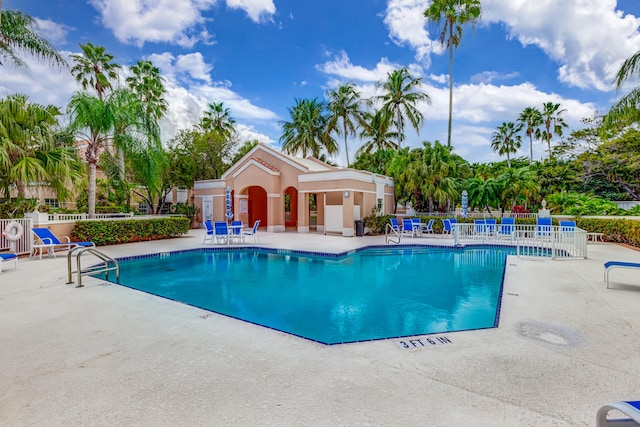 view of swimming pool featuring a patio area