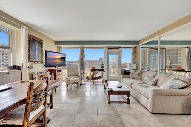 living room with light tile patterned floors