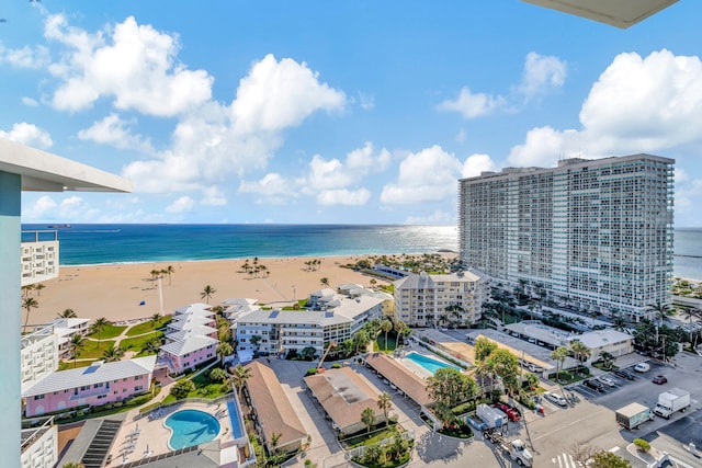 aerial view with a water view and a view of the beach