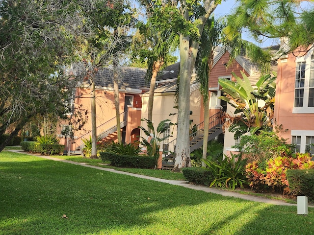 view of front of home with a front lawn