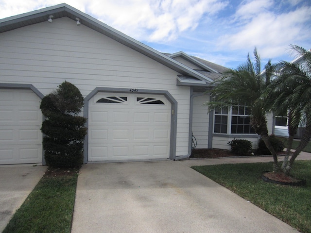 single story home with a garage