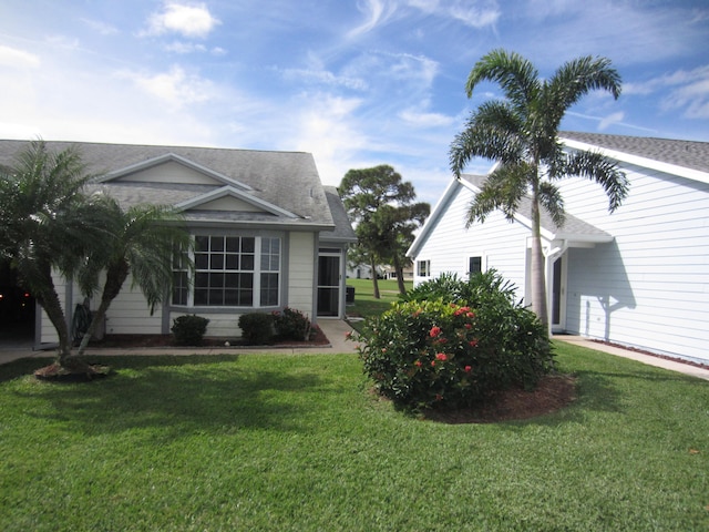 exterior space with a yard