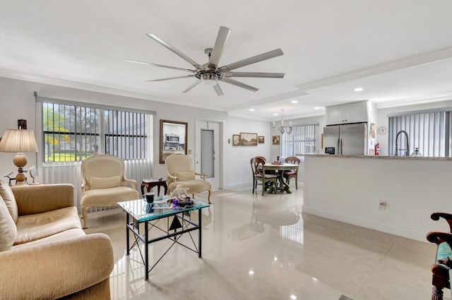 living room featuring crown molding, ceiling fan, and light tile floors