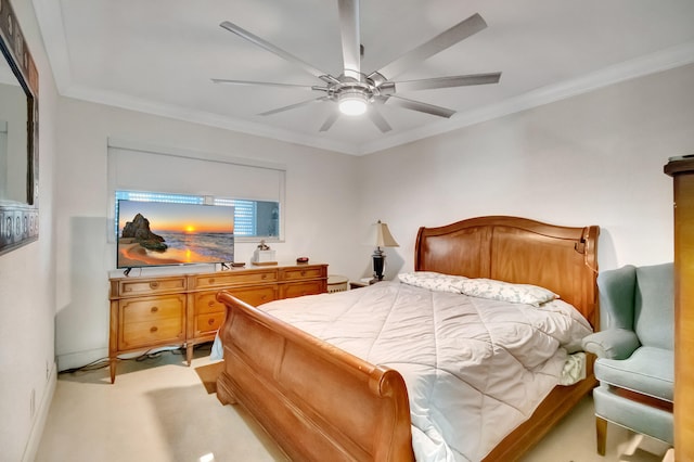 bedroom featuring light colored carpet, ceiling fan, and crown molding