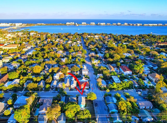 bird's eye view with a water view