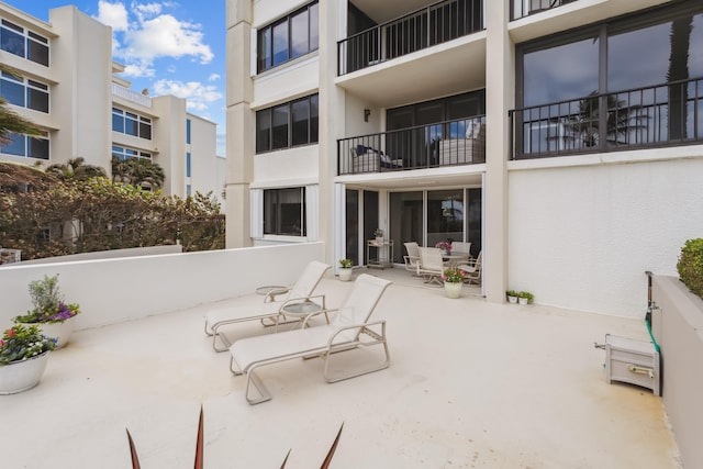 view of patio / terrace with a balcony