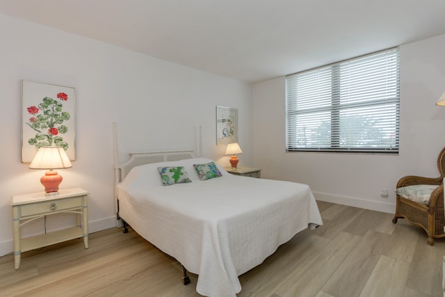 bedroom featuring light hardwood / wood-style flooring