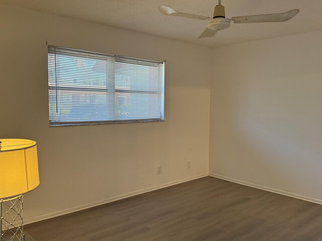 unfurnished bedroom with a textured ceiling and hardwood / wood-style floors