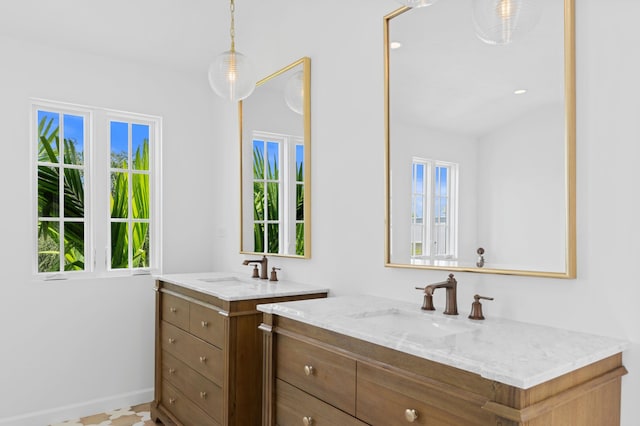 bathroom featuring vanity and a healthy amount of sunlight