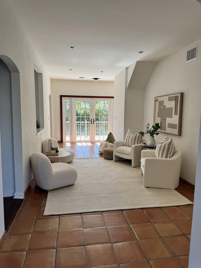 tiled living room with french doors