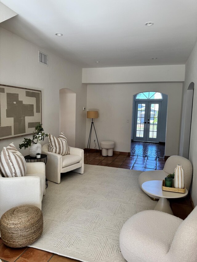 tiled living room with french doors