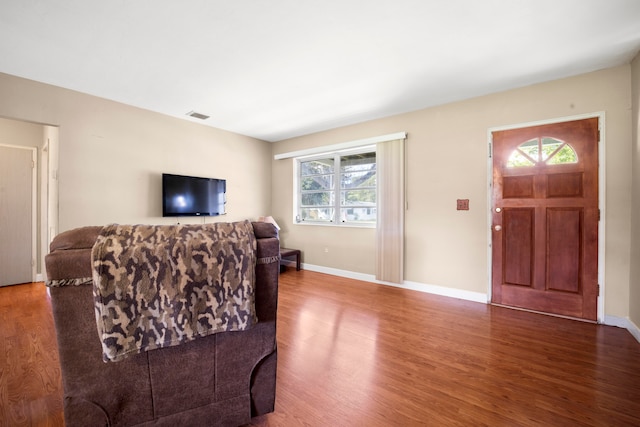 living room with dark wood-type flooring