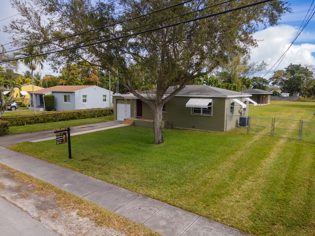 ranch-style house featuring a front yard