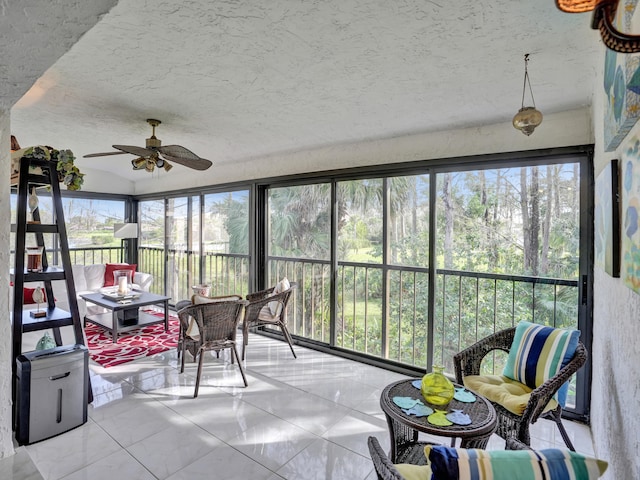 sunroom / solarium with ceiling fan