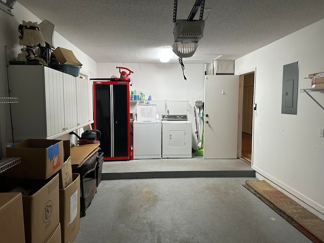 garage with washer and clothes dryer and a garage door opener