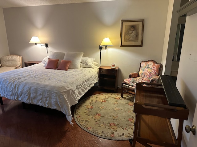 bedroom with wood-type flooring