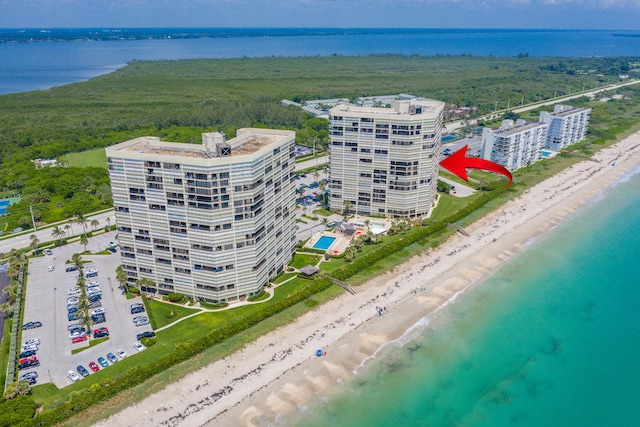 aerial view with a beach view and a water view