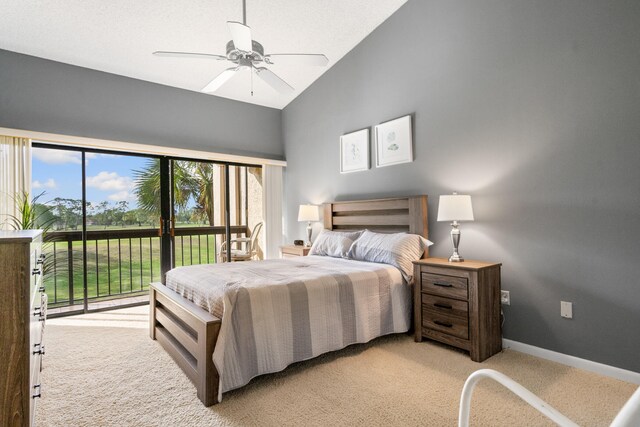 carpeted bedroom featuring high vaulted ceiling, access to exterior, and ceiling fan