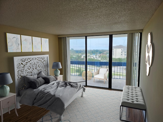 bedroom featuring expansive windows, a textured ceiling, access to exterior, and light colored carpet