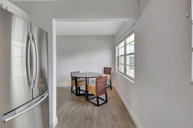 dining room featuring light hardwood / wood-style floors