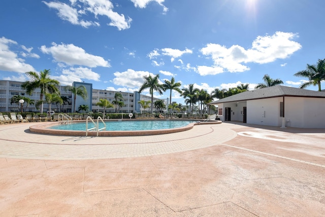 view of pool featuring a patio area