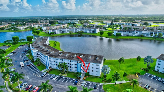 drone / aerial view with a water view