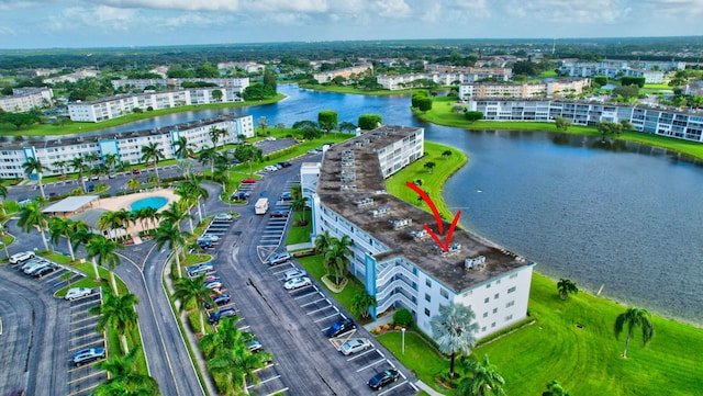 bird's eye view with a water view