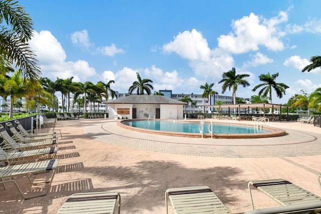 view of swimming pool featuring a patio area