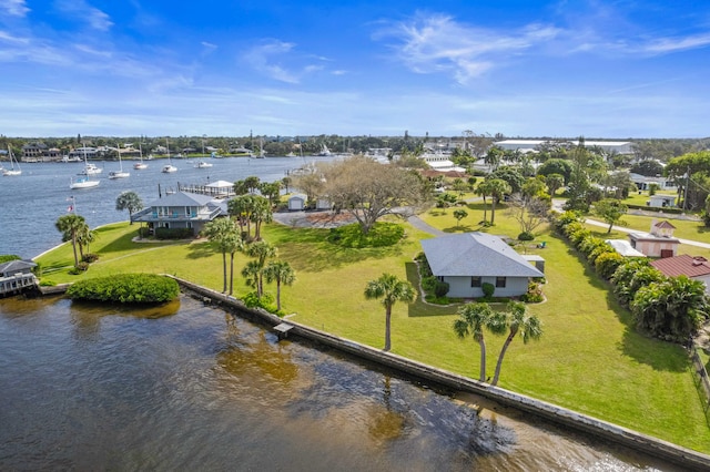 drone / aerial view with a water view