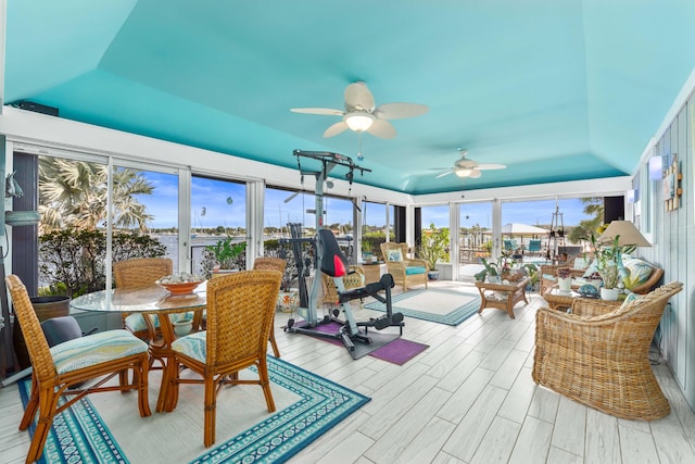 sunroom / solarium with ceiling fan