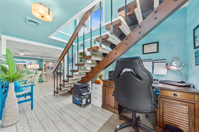 home office featuring ceiling fan and light wood-type flooring