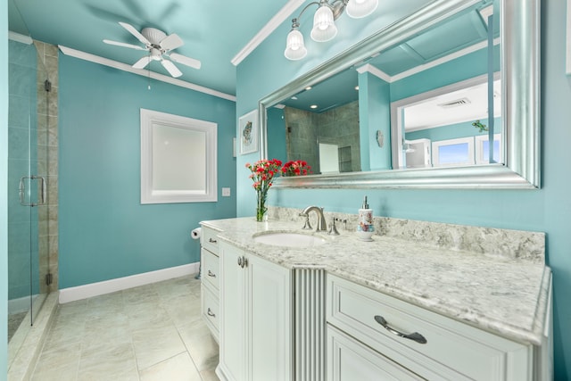 bathroom featuring vanity, ceiling fan, tile floors, a shower with door, and crown molding