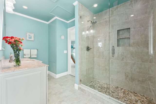 bathroom with tile flooring, ornamental molding, an enclosed shower, and vanity