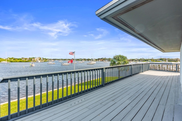 wooden terrace with a water view